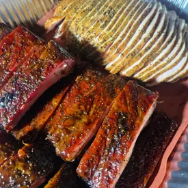 Услуги по приготовлению мяса, птицы, рыбы в смокерах